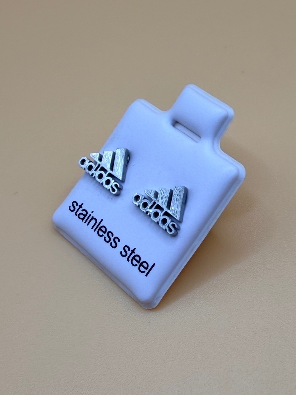 Unisex Stainless Steel Logo Stud Earrings - Silver